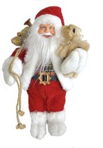 Kerstman staande met een zak cadeaus en een beer | De kerstdecoratie is 30 cm. hoog