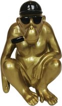 Beeld aap met pet en sigaar goud
