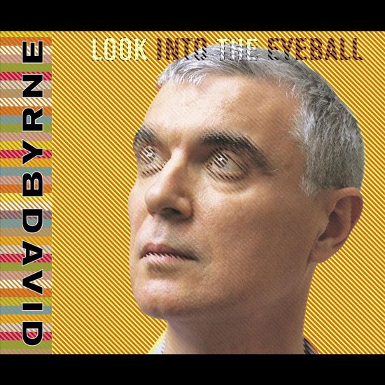Kop van David Byrne met tekst 'LOOK INTO THE EYEBALL' en gekleurde strepen.