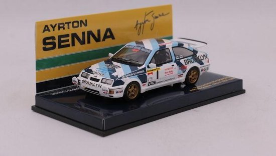 The 1:43 Diecast model of the Ford Sierra RS Cosworth of a Rally test in 1986. The driver was Ayrton Senna. The manufacturer of this scalemodel is Minichamps.