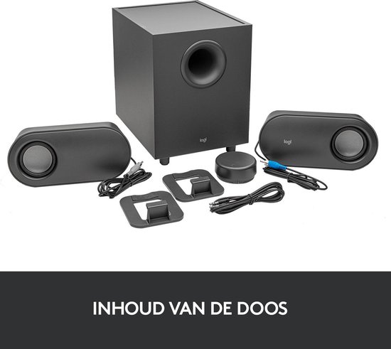 Inhoud van de doos: zwarte subwoofer, twee grijze speakers, volumeknop, stroomkabels en standaards.