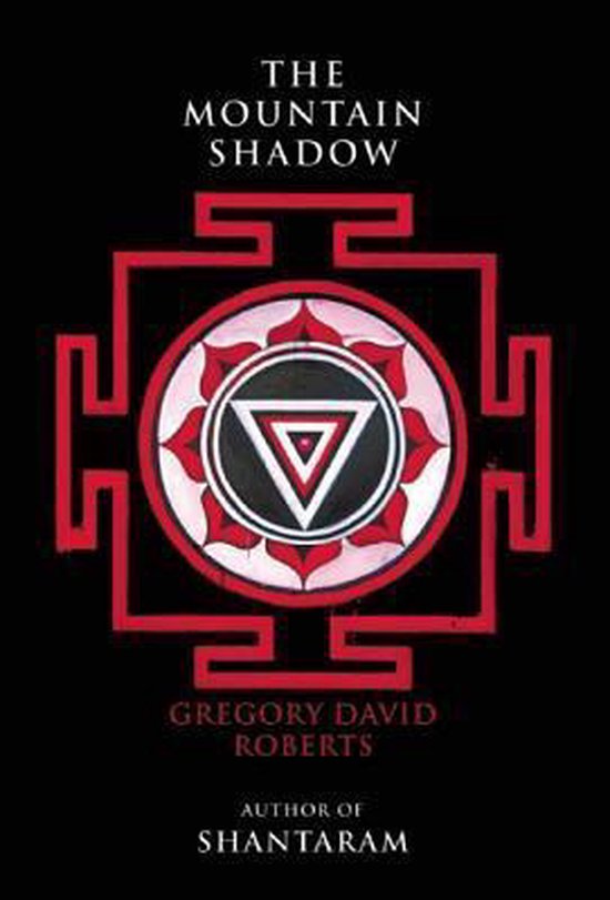 Boekomslag van 'The Mountain Shadow' met een rood symbool en tekst. Titel: THE MOUNTAIN SHADOW. Auteur: GREGORY DAVID ROBERTS.