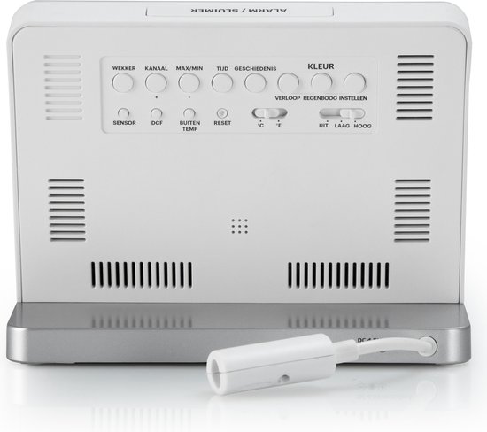 Achterkant van een wit digitaal weerstation met diverse knoppen en functies, waaronder 'wekker', 'kanaal' en 'kleur'.