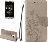 Voor Asus ZenFone 3 / ZE552KL geperst bloemenpatroon lederen tas met houder & kaartsleuven & portemonnee (grijs)
