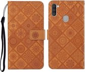 Voor Samsung Galaxy A11 etnische stijl reliëf patroon horizontale flip lederen tas met houder & kaartsleuven & portemonnee & lanyard (bruin)