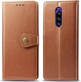 Retro lederen gesp in effen kleur Leren beschermhoes voor mobiele telefoon met draagkoord & fotolijst & kaartsleuf & portemonnee & beugelfunctie voor Sony Xperia XZ4 (bruin)