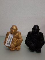 2 beelden van apen