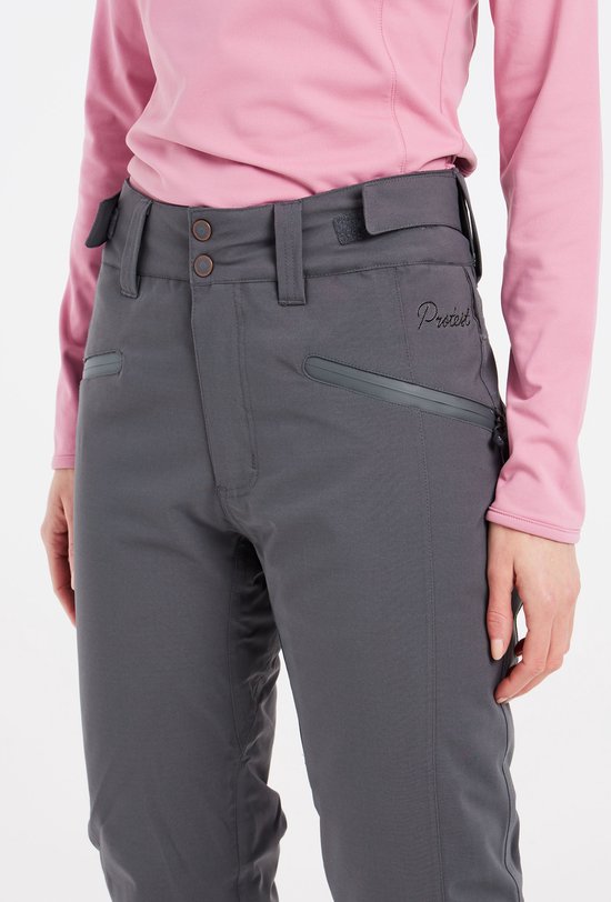 Avant d'un pantalon de ski gris avec col roulé rose et poches zippées.