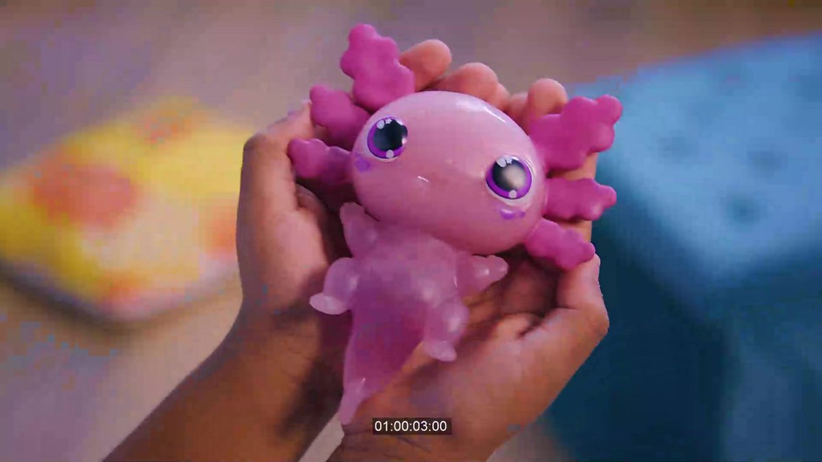 Axolotl électronique Animagic Let's Glo – Bleu, Corps Extensible, Brille Dans L'eau, Dès 4 Ans