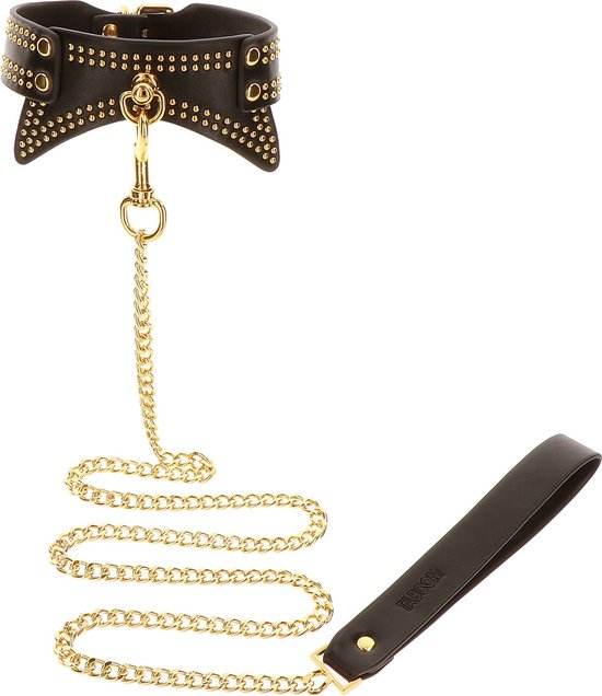 Zwarte taboom kraag met gouden studs en ketting, met handvat.