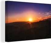 Canvas Schilderij Zonsondergang over bergen - 180x120 cm - Wanddecoratie XXL