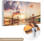 MuchoWow® Glasschilderij 80x40 cm - Schilderij acrylglas - New York - Brooklyn - Bridge - Zonsondergang - Foto op glas - Schilderijen