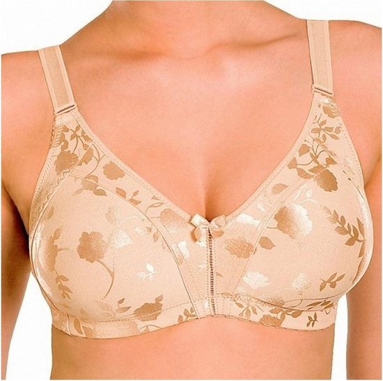 Model draagt een beige minimizer bh met bloemenprint en strikje.