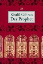 Boek 'Der Prophet' van Khalil Gibran op een rode omslag met gouden decoraties.