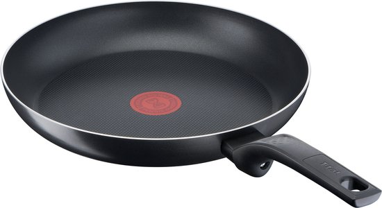 Zwarte koekenpan met steel, rode Thermo-Spot en kleine puntjes op de bodem.