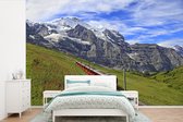 Behang - Fotobehang Trein rijd over Jungfraujoch - Breedte 360 cm x hoogte 240 cm