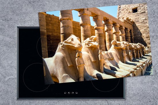 KitchenYeah® Inductie beschermer 76x51.5 cm - Aantal beelden in het tempelcomplex van Karnak in Egypte - Kookplaataccessoires - Afdekplaat voor kookplaat - Inductiebeschermer - Inductiemat - Inductieplaat mat - Merkloos