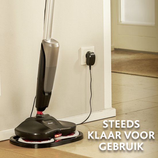 Zwarte Vileda Looper vloermop op laadstation naast een stopcontact, met tekst 'STEEDS KLAAR VOOR GEBRUIK'.