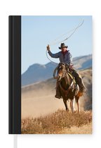 Notitieboek - Schrijfboek - Een cowboy met een lasso - Notitieboekje klein - A5 formaat - Schrijfblok