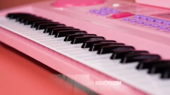 Petit piano rose pour enfant 15 touches blanches et 10 touches noires