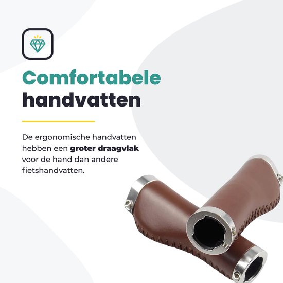 Bruine, ergonomische fietshandvatten van leer met zilverkleurige uiteinden en stiksels.