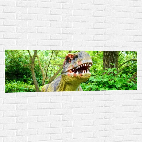 WallClassics - Muursticker - Dinosaurus in het Bos - 150x50 cm Foto op Muursticker