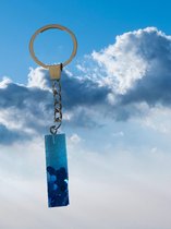 Epoxy letter sleutel- of tassenhanger I, glitter blauw