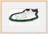 Last trend in fashion accessoires brillenkoord word vervangen door modieus Groen kleur grote schakels ketting.