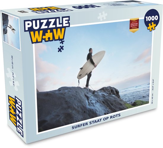 Puzzle Surf 1000 pièces - Surfer est debout sur un rocher | bol.com