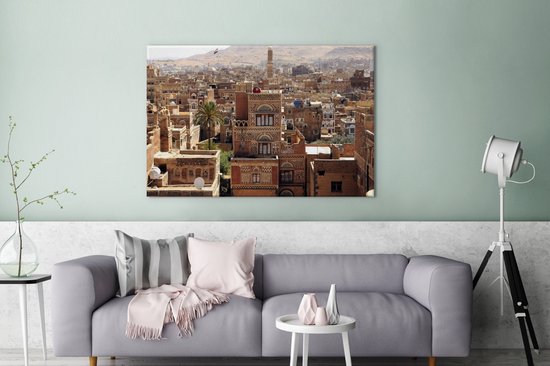 Paysage urbain du centre-ville et palmier solitaire de Sanaa au Yémen Toile 140x90 cm - Tirage photo sur toile (Décoration murale salon / chambre)