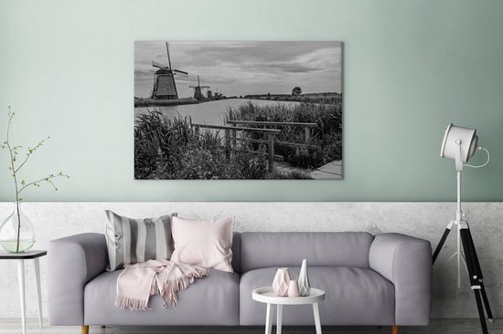 Photo Zwart et blanc des moulins à vent de Kinderdijk aux Nederland Toile 180x120 cm - Tirage photo sur toile (Décoration murale salon / chambre) XXL / Groot format!