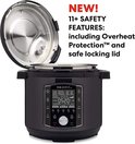 Een zwarte Instant Pot Pro multicooker met het deksel open, de tekst "NEW! 11+ SAFETY FEATURES" staat erop.