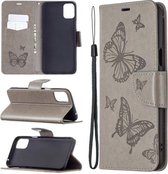 Voor LG K42 Two Butterflies Embossing Pattern Horizontale Flip Leather Case met houder & kaartsleuf & portemonnee & lanyard (grijs)