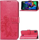 Voor LG K20 2019 Vierbladige Sluiting Reliëf Gesp Mobiele Telefoon Bescherming Lederen Case met Lanyard & Card Slot & Portemonnee & Beugel Functie (Magenta)