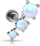 Tragus piercing triple opal