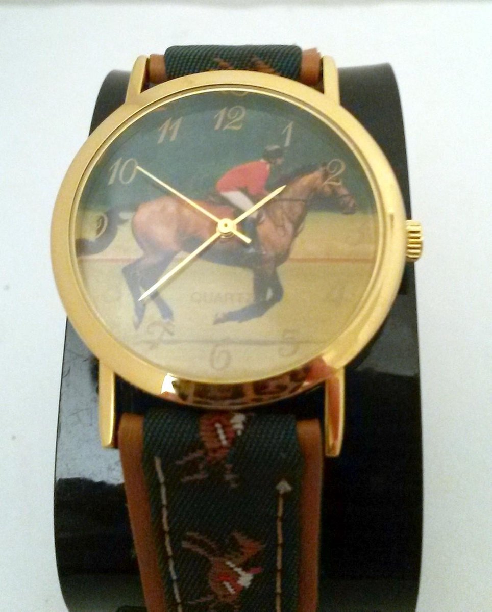 Goudkleurig horloge met paard en ruiter