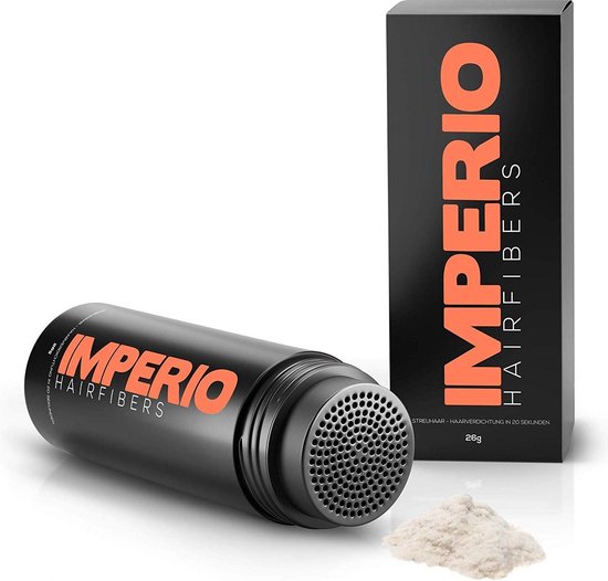 Zwarte fles IMPERIO HAIRFIBERS met een sproeidop en een doosje ernaast. Een hoopje wit poeder.