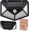 Zwarte buitenlamp op zonne-energie met bewegingssensor, verpakking en kleinere lamp.