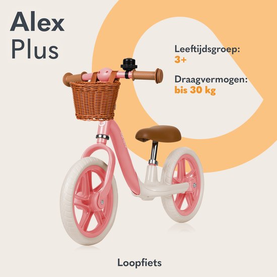 Roze loopfiets met bruin zadel, rotan mandje, geschikt voor 3+ jaar en tot 30 kg.