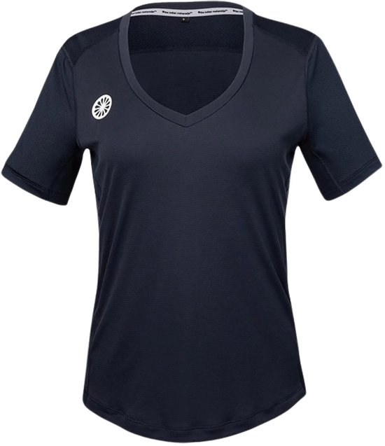 Donkerblauw sportshirt voor dames met V-hals, korte mouwen en een wit logo met cirkelmotief op de linkerborst.