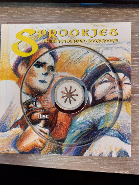 CD-hoes met illustraties van gezichten en de titel 'Sprookjes Aladdin en de Lasop - Doornpoosje'.