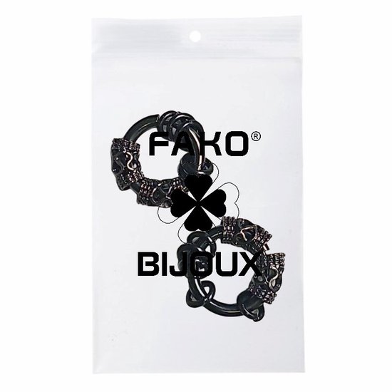 Deux boucles d'oreilles noires avec un design de crâne dans un emballage transparent avec 'Fako Bijoux'.