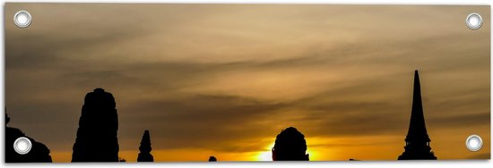 Tuinposter – Silhouet van Boeddhistiche Tempels tijdens Zonsondergang - 60x20 cm Foto op Tuinposter (wanddecoratie voor buiten en binnen)