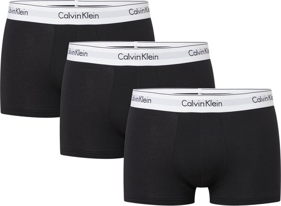 Drie zwarte Calvin Klein trunks, met wit logo-elastiek.
