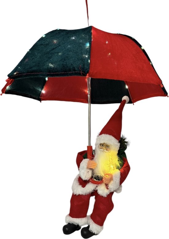 Kerstman hangend aan paraplu met rode en groene vlakken, met lichtjes. Hij houdt een lampje vast.