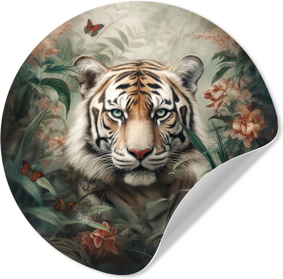Un sticker mural rond représentant un tigre majestueux entouré de luxuriantes feuilles de jungle vertes et de fleurs orangées. Quatre papillons orange volent autour du tigre.