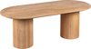 Ovale eettafel van naturel mangohout met twee cilindervormige, geribbelde pootjes, gezien vanuit een hoek.