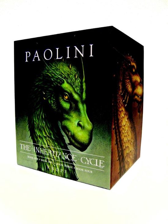 Coffret 'The Inheritance Cycle' de Paolini. Têtes de dragons verte et dorée sur la couverture. Titre : THE INHERITANCE CYCLE.