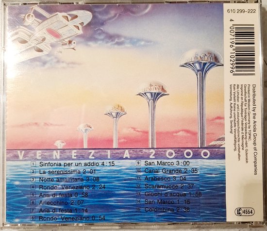 Achterkant cd 'Venezia 2000' met tracklist, vliegend ruimteschip en futuristische torens.