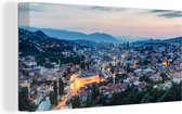 Canvas Schilderij Cityscape van Sarajevo in Bosnië en Herzegovina - 40x20 cm - Wanddecoratie